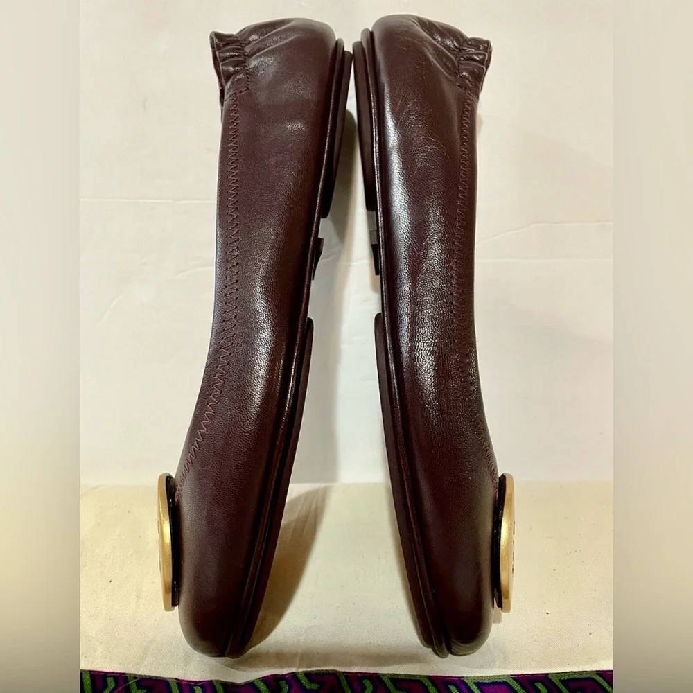 Tory Burch Women's Burgundy  Flats with Gold Emblem. - Picture 8 of 16